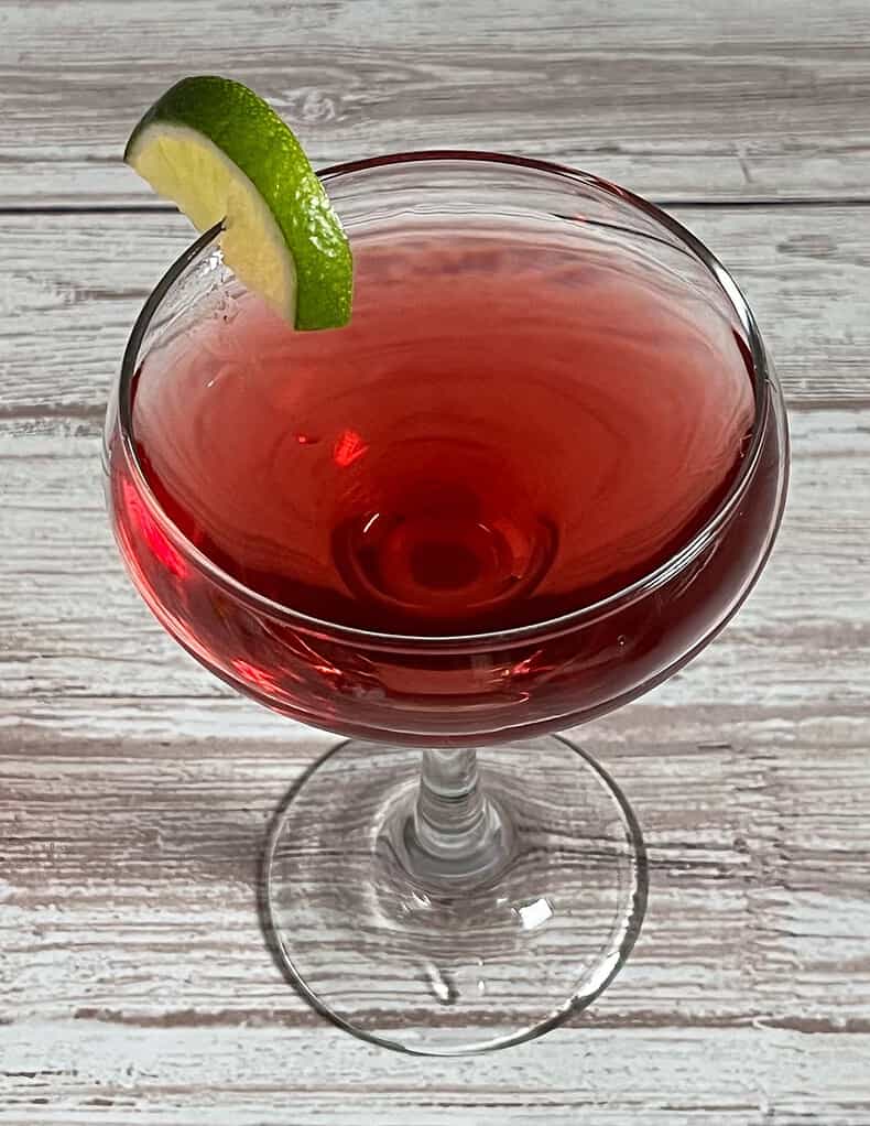 Adding Pomegranate mix to the Coupe Glass