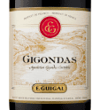 Beige E. Guigal Gigondas wine winbel with brown sketch rendering of river and sloped vineyards on each bank.