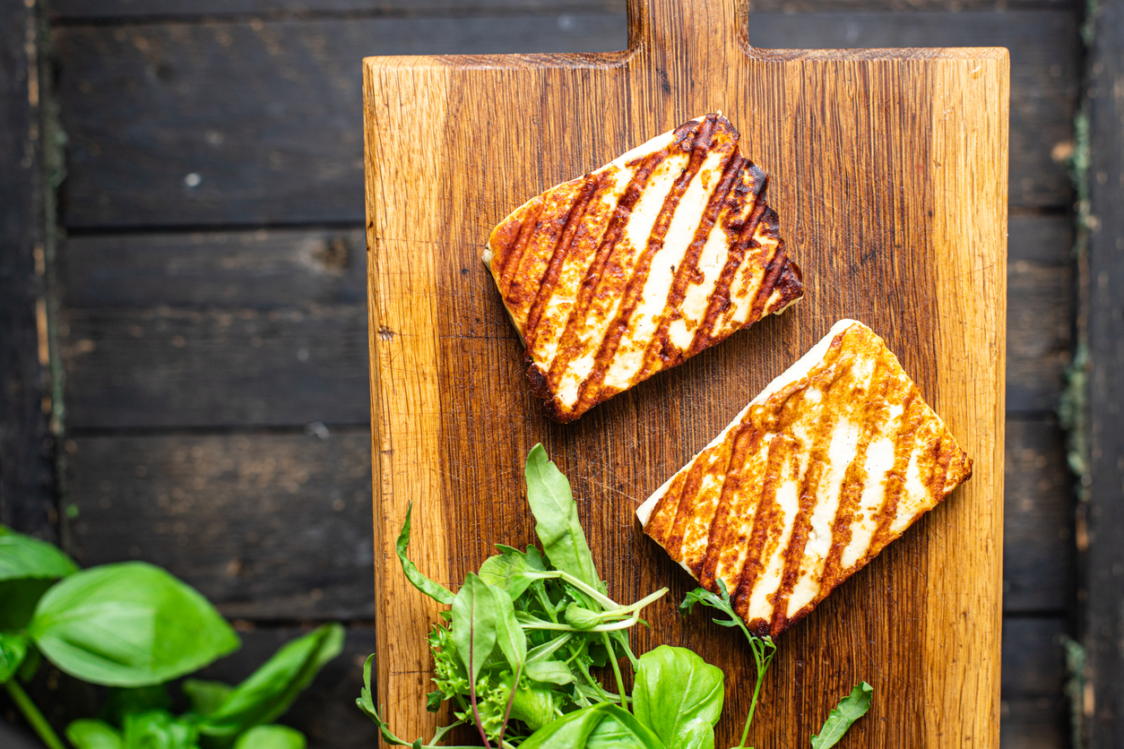 grilled cheese halloumi fried meal snack copy space food background rustic. top view keto or paleo diet grilled halloumi