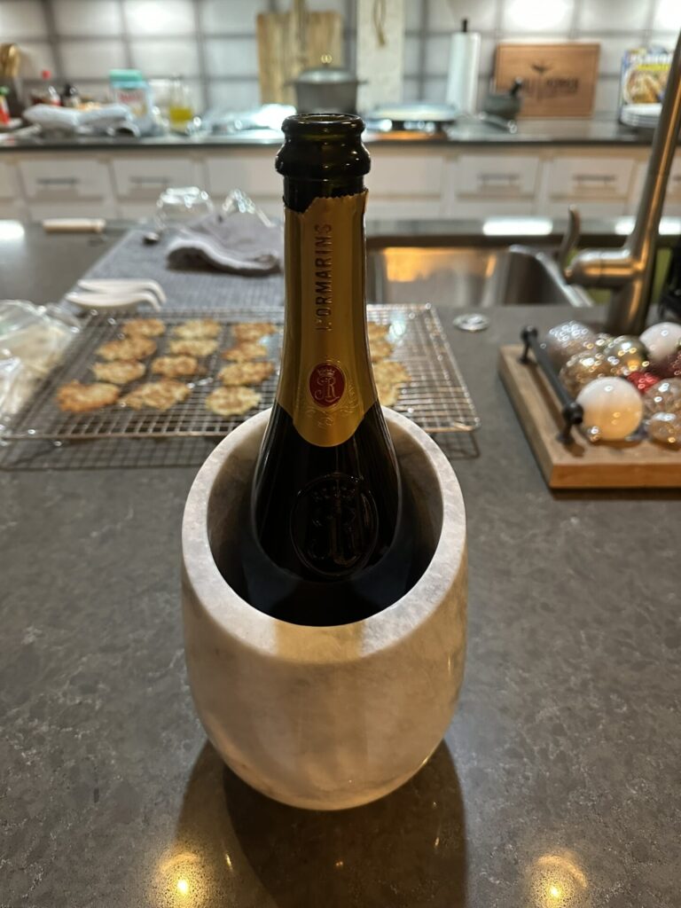 Bottle of Champagne in a stone chiller