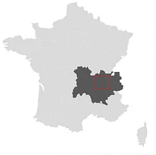 Light gray outline of France with the South Central region of Beaujolais shown in dark gray. About 5 o'clock on a watch